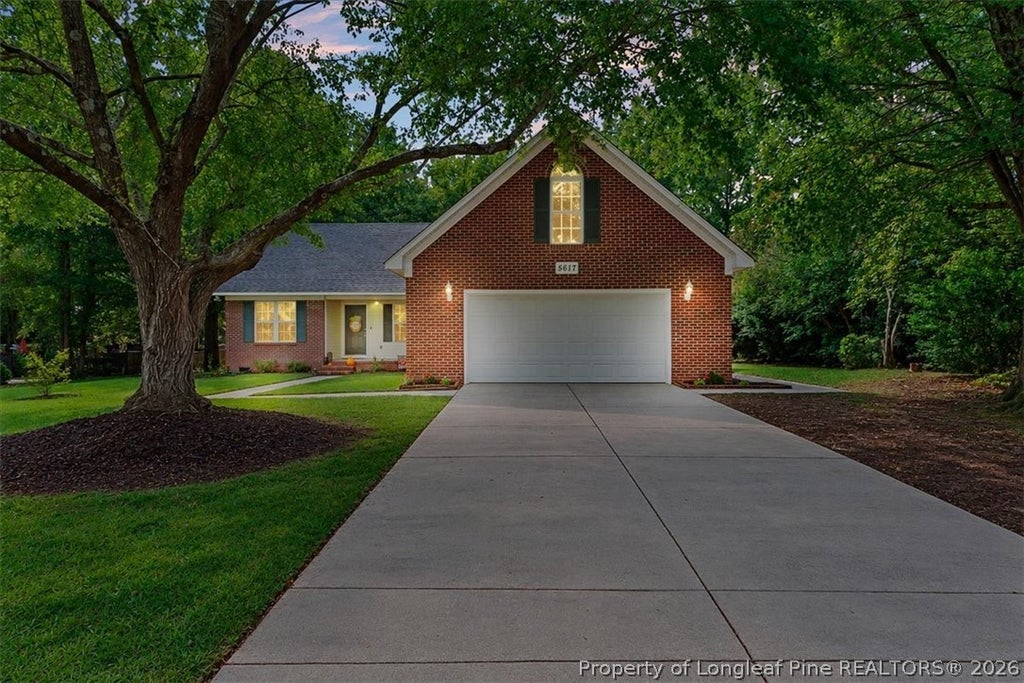 Photo of 5617 Finish Line Drive, Hope Mills, NC 28348 (MLS # 769762)