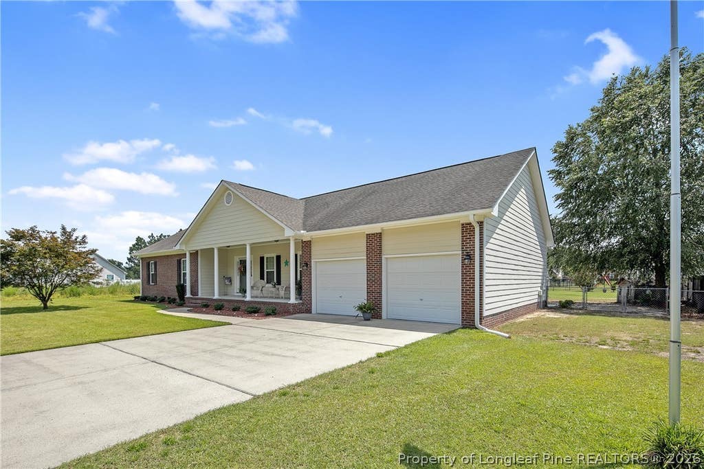 Photo of 1916 Pineville Drive, Hope Mills, NC 28348 (MLS # 767489)