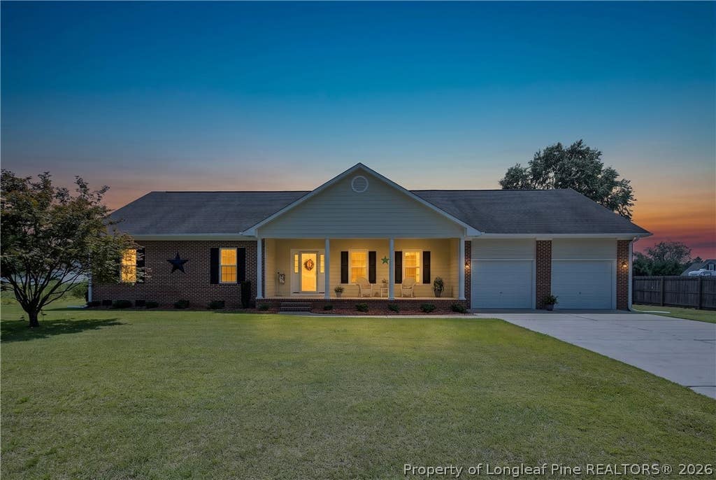 Photo of 1916 Pineville Drive, Hope Mills, NC 28348 (MLS # 767489)