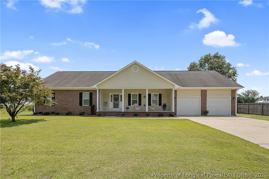 Photo of 1916 Pineville Drive, Hope Mills, NC 28348 (MLS # 767489)