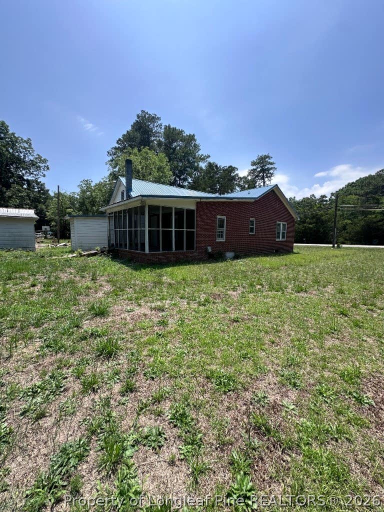 Photo of 916 Aberdeen Road, Laurinburg, NC 28352 (MLS # 765328)