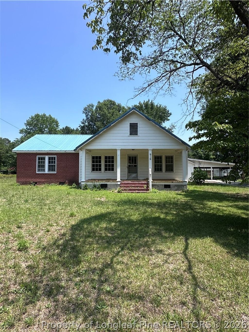 Photo of 916 Aberdeen Road, Laurinburg, NC 28352 (MLS # 765328)