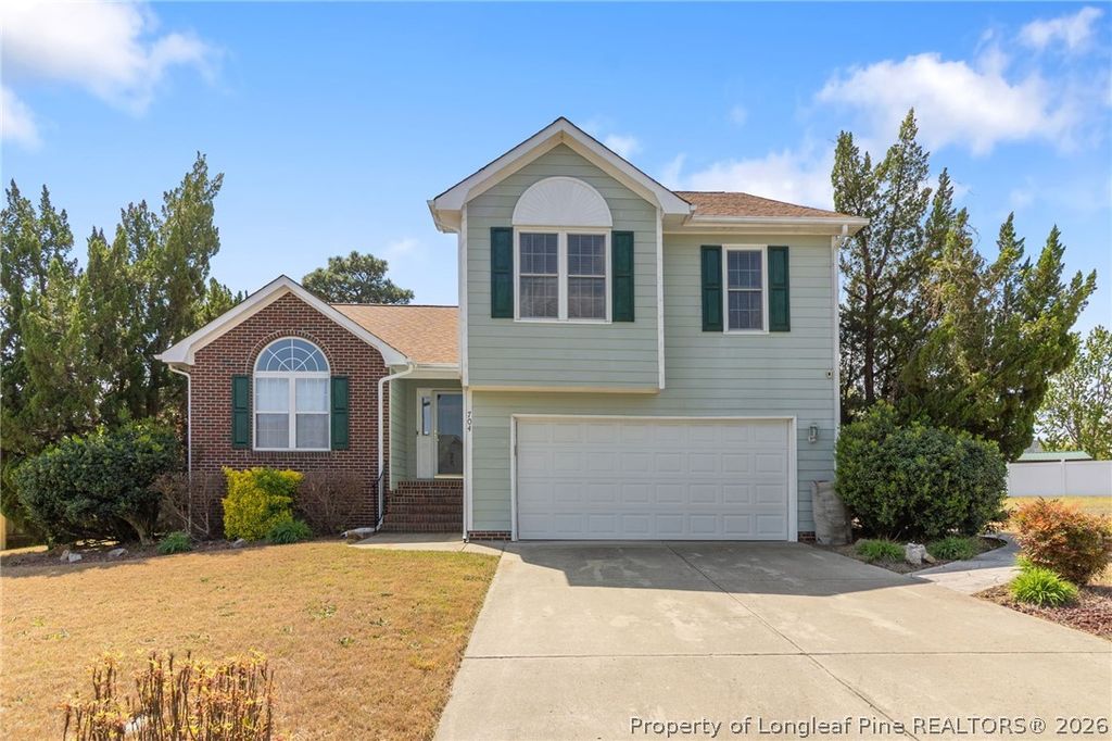 Photo of 704 Fairbluff Drive, Hope Mills, NC 28348 (MLS # 760050)