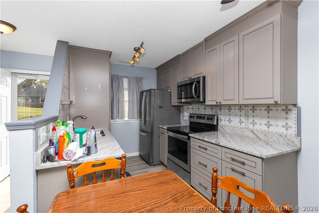 Photo of 212 Kentucky Drive #212, Garner, NC 27529 (MLS # 759762)