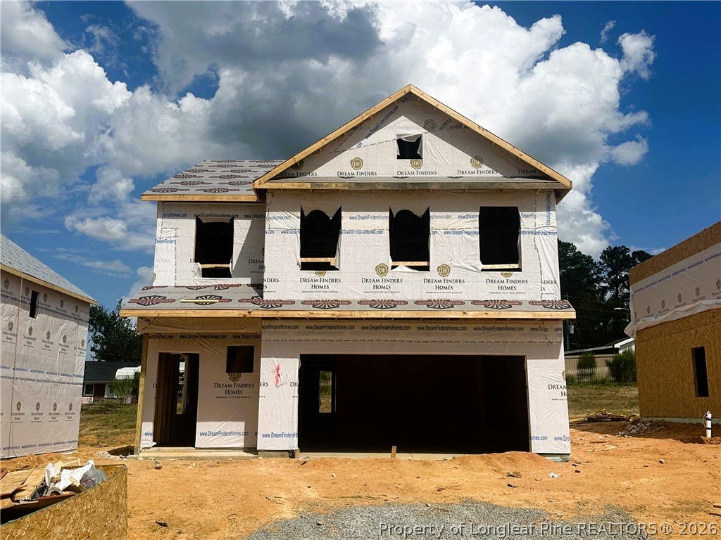 Photo of 86 Stone Creek (Lot 11) Drive, Coats, NC 27521 (MLS # 767294)