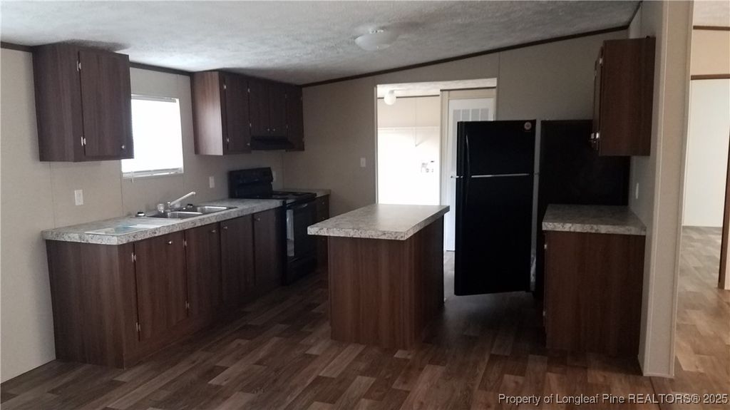 Photo of 4076 Meadow Road N, Lumberton, NC 28358 (MLS # 752941)