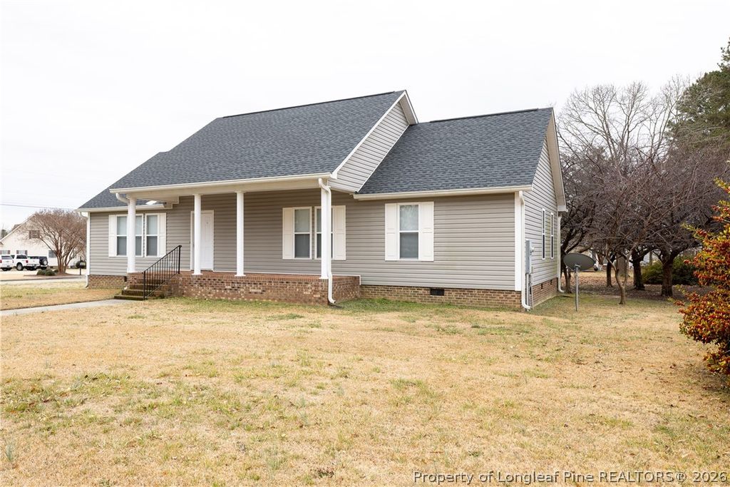 Photo of 401 W Brocklyn Street, Benson, NC 27504 (MLS # 757153)