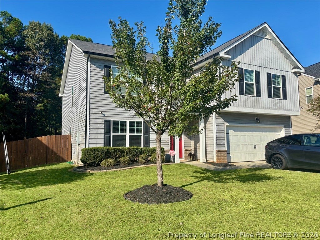 Photo of 215 AMBERGATE Drive, Youngsville, NC 27596 (MLS # 771391)