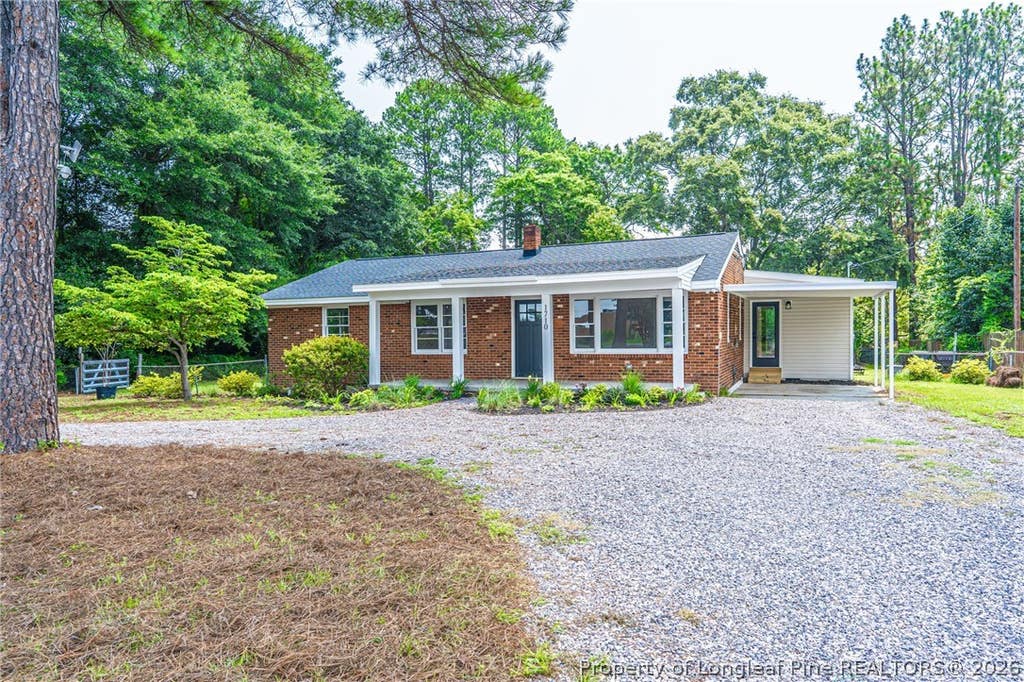 Photo of 1710 N Poplar Street, Aberdeen, NC 28315 (MLS # 766408)