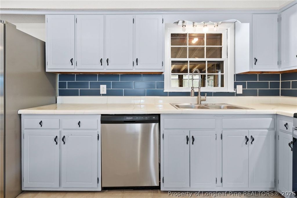 Photo of 6042 McDougal Drive, Fayetteville, NC 28304 (MLS # 759709)