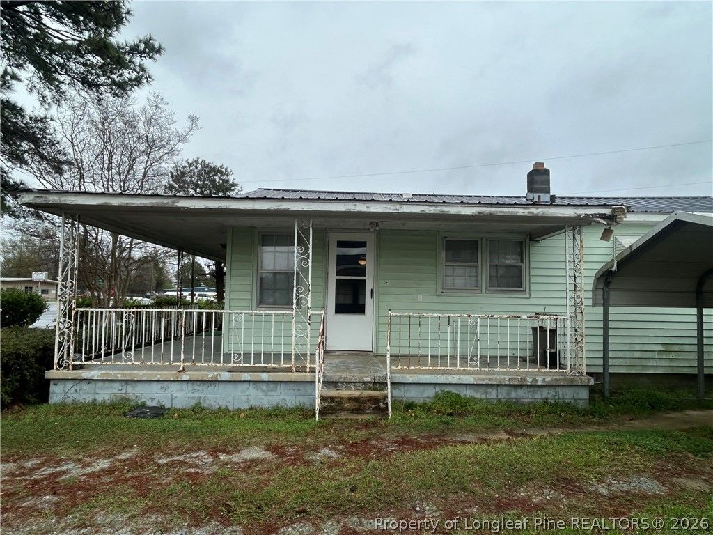 Photo of 118 Martin Luther King Jr Boulevard, Clinton, NC 28328 (MLS # 758853)