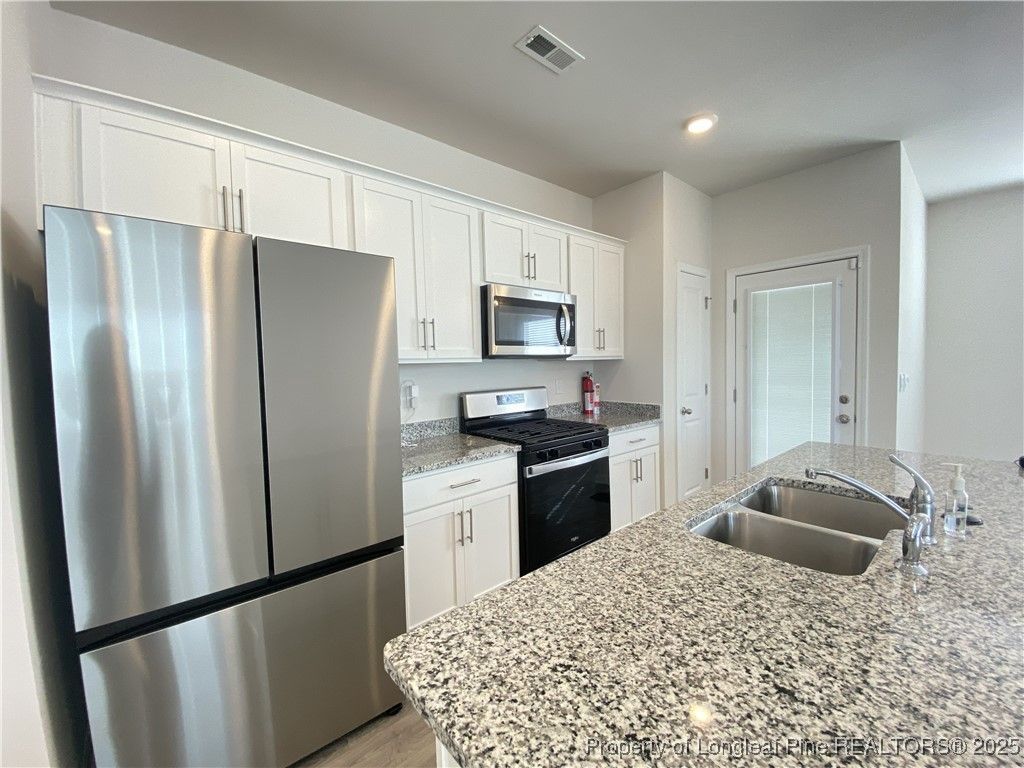 Photo of 232 David Hill Drive, Sanford, NC 27330 (MLS # 751991)