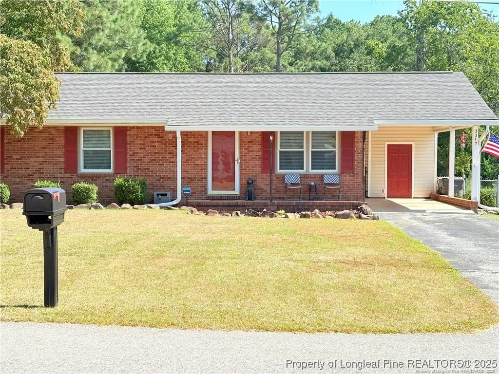 Photo of 3317 Forest Lake Drive, Hope Mills, NC 28348 (MLS # 751400)