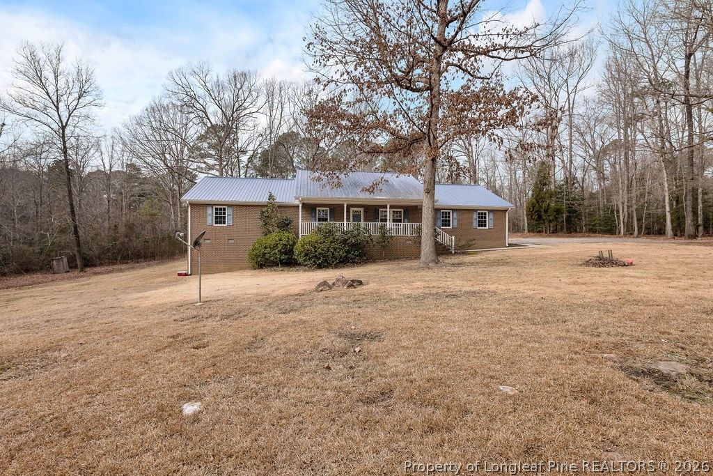 Photo of 698 Sheriff Watson Road, Sanford, NC 27332 (MLS # 757033)