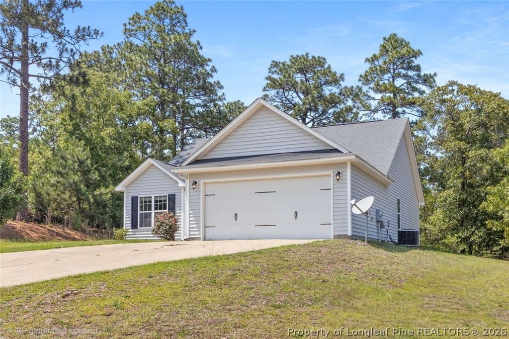 Photo of 321 Maria Drive, Raeford, NC 28376 (MLS # 764430)