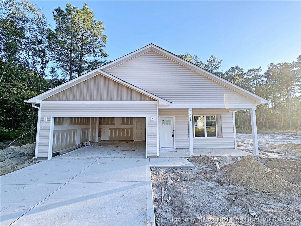 Photo of 228 Woodcrest Jones Drive, Raeford, NC 28376 (MLS # 752471)