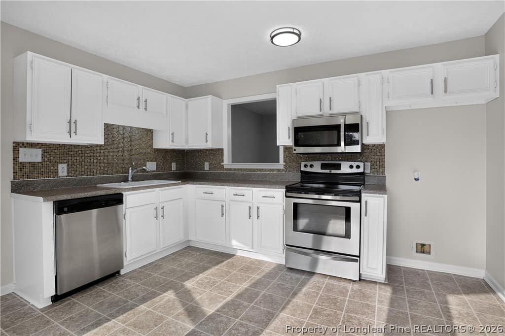 Photo of 201 Laketree Boulevard, Spring Lake, NC 28390 (MLS # 767105)
