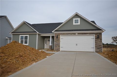 Photo of 1716 Man-O-War Drive, Hope Mills, NC 28348 (MLS # 754289)