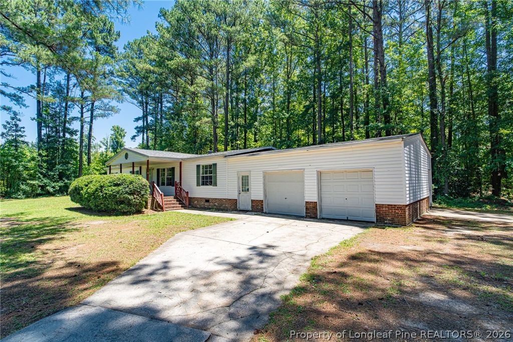 Photo of 104 Poplar Mills Road, Bunnlevel, NC 28323 (MLS # 765337)