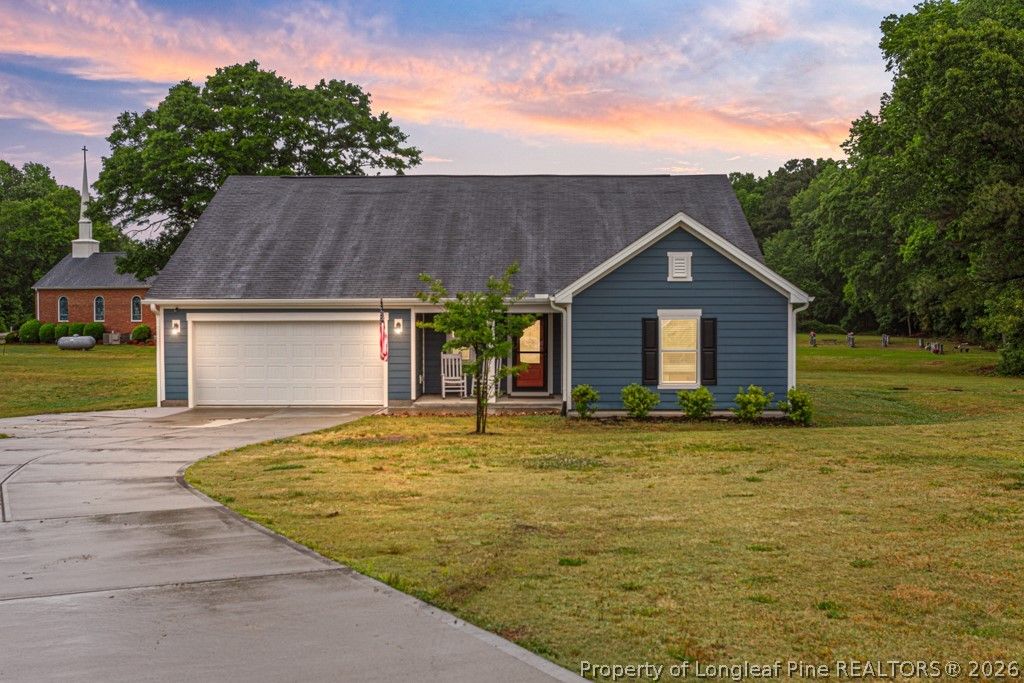 Photo of 405 Thorny Branch Drive, Raleigh, NC 27603 (MLS # 761135)