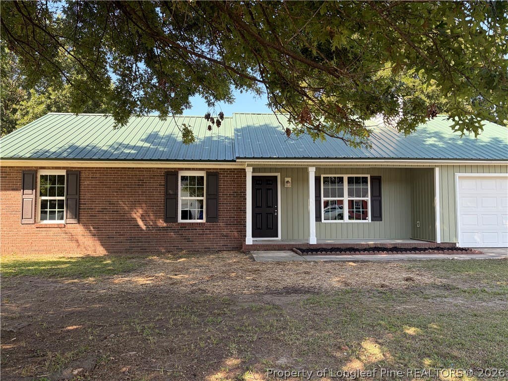 Photo of 401 Northwoods Drive, Raeford, NC 28376 (MLS # 767959)