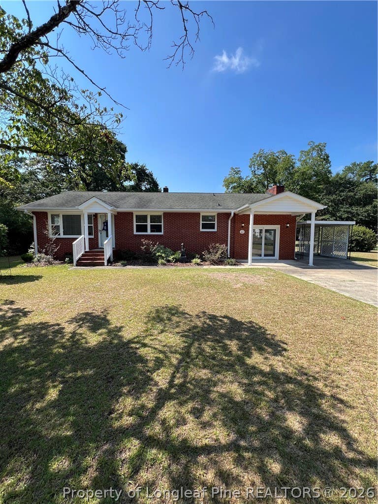 Photo of 62 Boone Road, Lumberton, NC 28360 (MLS # 768166)