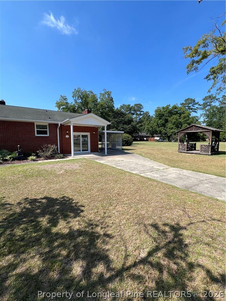 Photo of 62 Boone Road, Lumberton, NC 28360 (MLS # 768166)