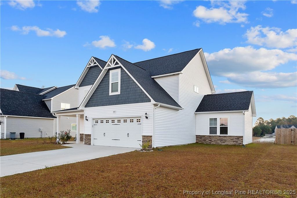 Photo of 509 Amusement (Lot 179) Drive, Hope Mills, NC 28348 (MLS # 753067)