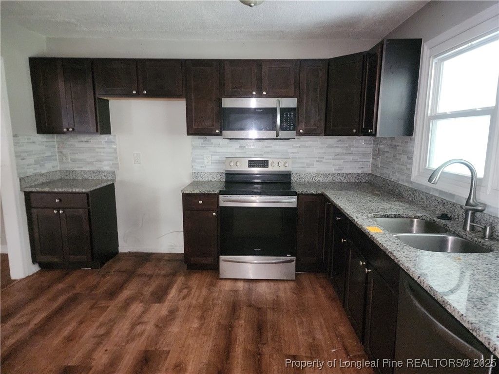 Photo of 732 Sarazen Drive, Fayetteville, NC 28303 (MLS # 751748)