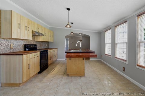 Tiny photo for 128 & 124 Skip A Rock Lane, Hope Mills, NC 28348 (MLS # 761464)