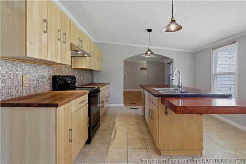 Tiny photo for 128 & 124 Skip A Rock Lane, Hope Mills, NC 28348 (MLS # 761464)