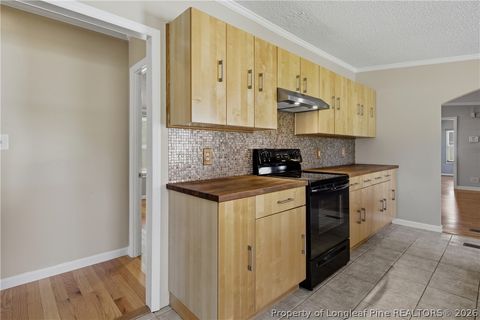 Tiny photo for 128 & 124 Skip A Rock Lane, Hope Mills, NC 28348 (MLS # 761464)