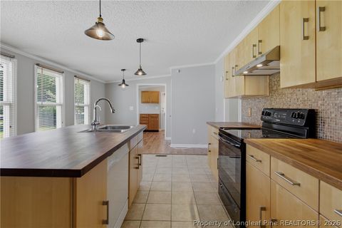 Tiny photo for 128 & 124 Skip A Rock Lane, Hope Mills, NC 28348 (MLS # 761464)