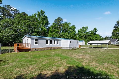 Tiny photo for 128 & 124 Skip A Rock Lane, Hope Mills, NC 28348 (MLS # 761464)