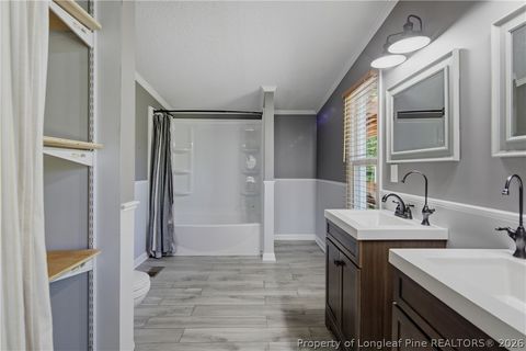 Tiny photo for 128 & 124 Skip A Rock Lane, Hope Mills, NC 28348 (MLS # 761464)