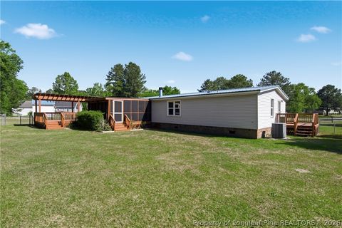 Tiny photo for 128 & 124 Skip A Rock Lane, Hope Mills, NC 28348 (MLS # 761464)