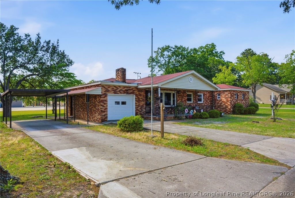 Photo of 409 N 4th Street, St Pauls, NC 28384 (MLS # 762559)
