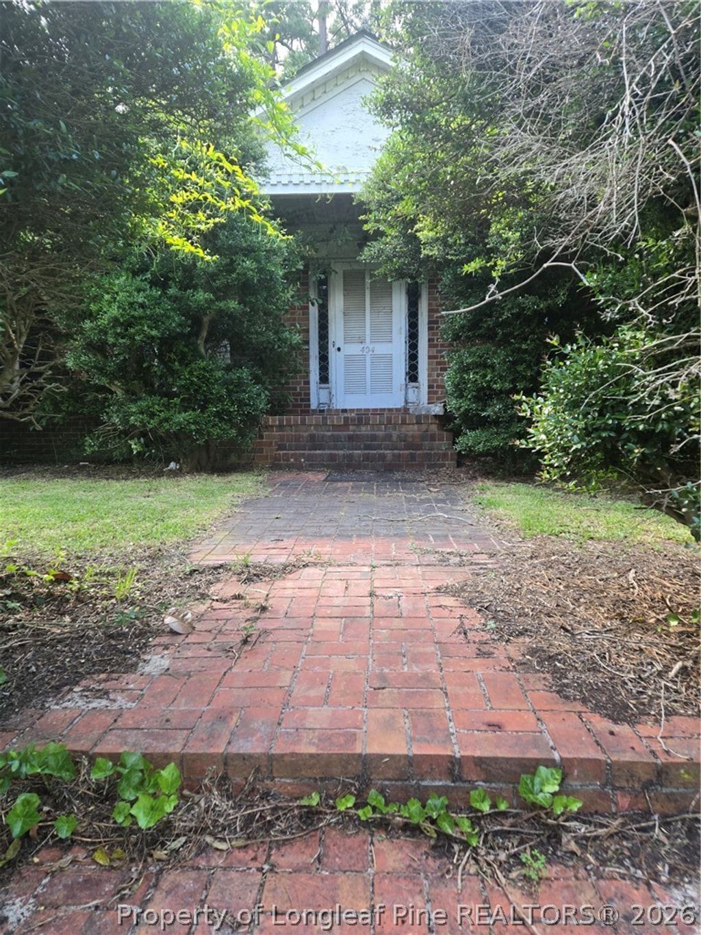 Photo of 404 W Main Street, Clinton, NC 28328 (MLS # 763925)