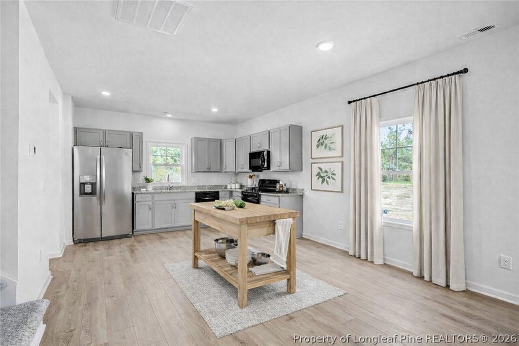 Photo of 545 Bartley Street, Vass, NC 28394 (MLS # 768483)