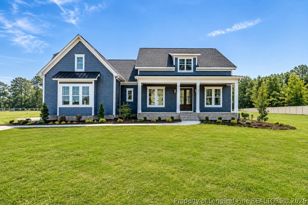 Photo of 925 Dixie Farm Road, Sanford, NC 27332 (MLS # 767891)