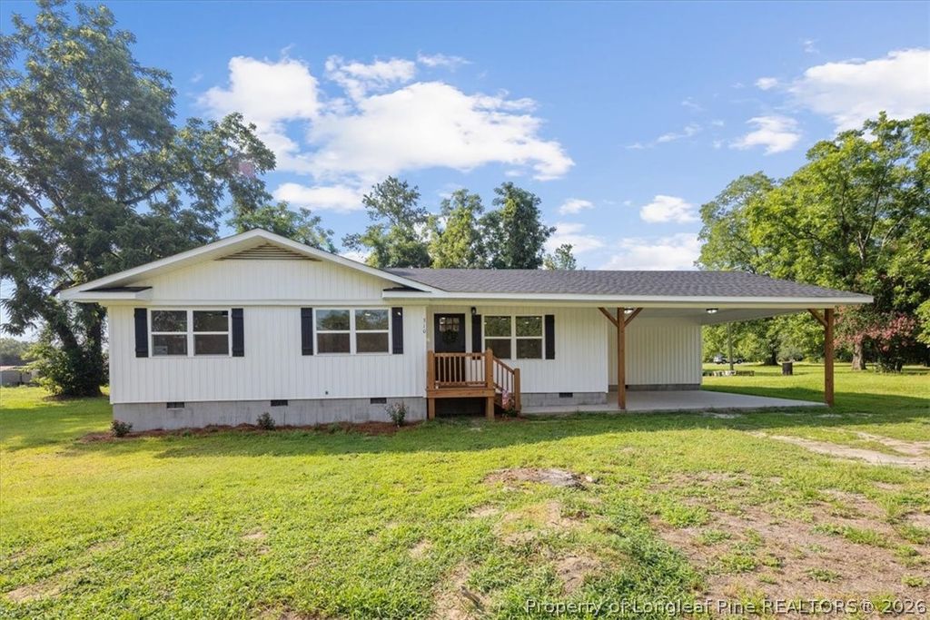Photo of 310 Saint James Street, Raeford, NC 28376 (MLS # 765586)