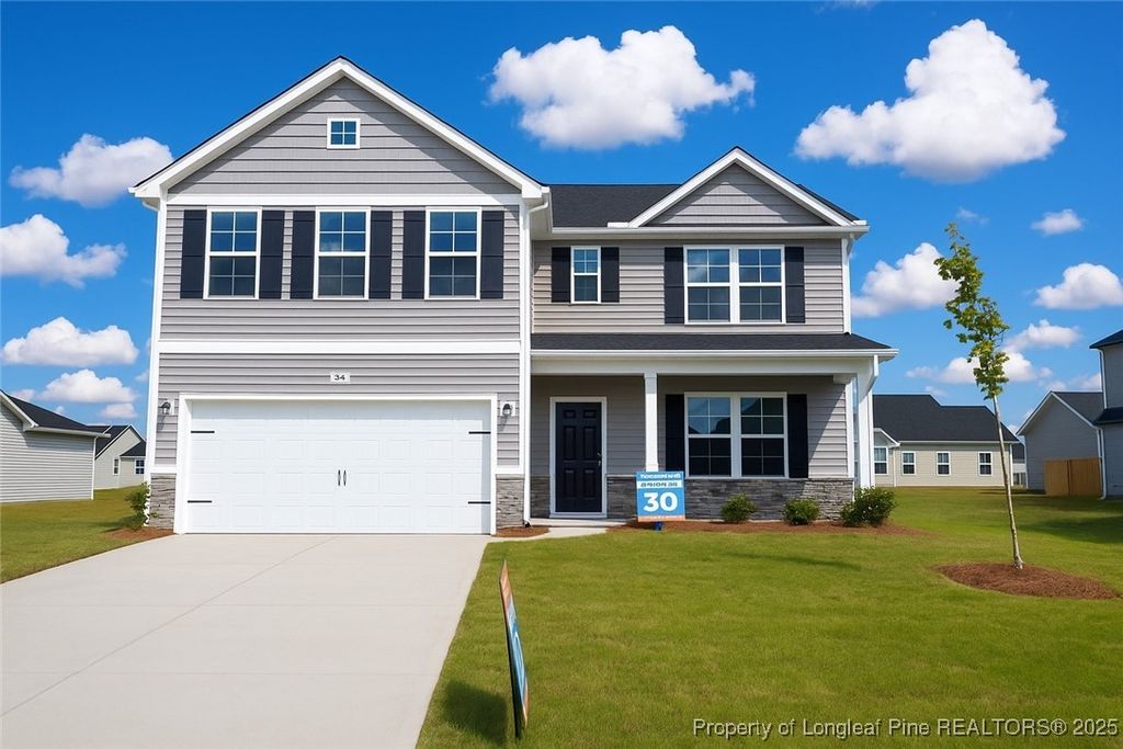 Photo of 307 Tulip Oak (Lot 100) Drive, Raeford, NC 28376 (MLS # 744286)