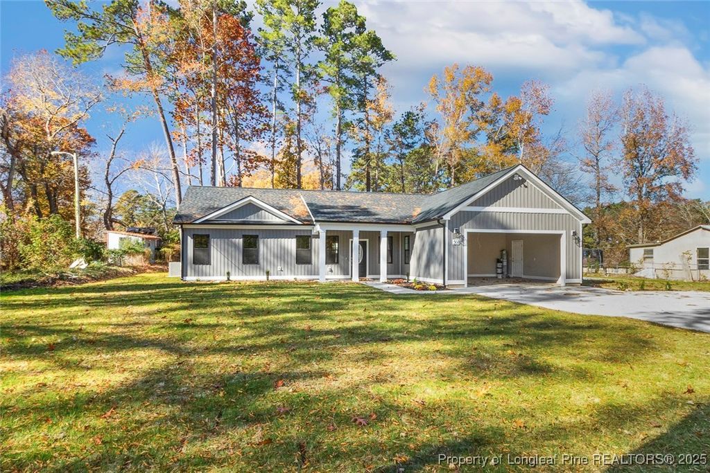 Photo of 504 Nixon Drive, Sanford, NC 27330 (MLS # 753257)