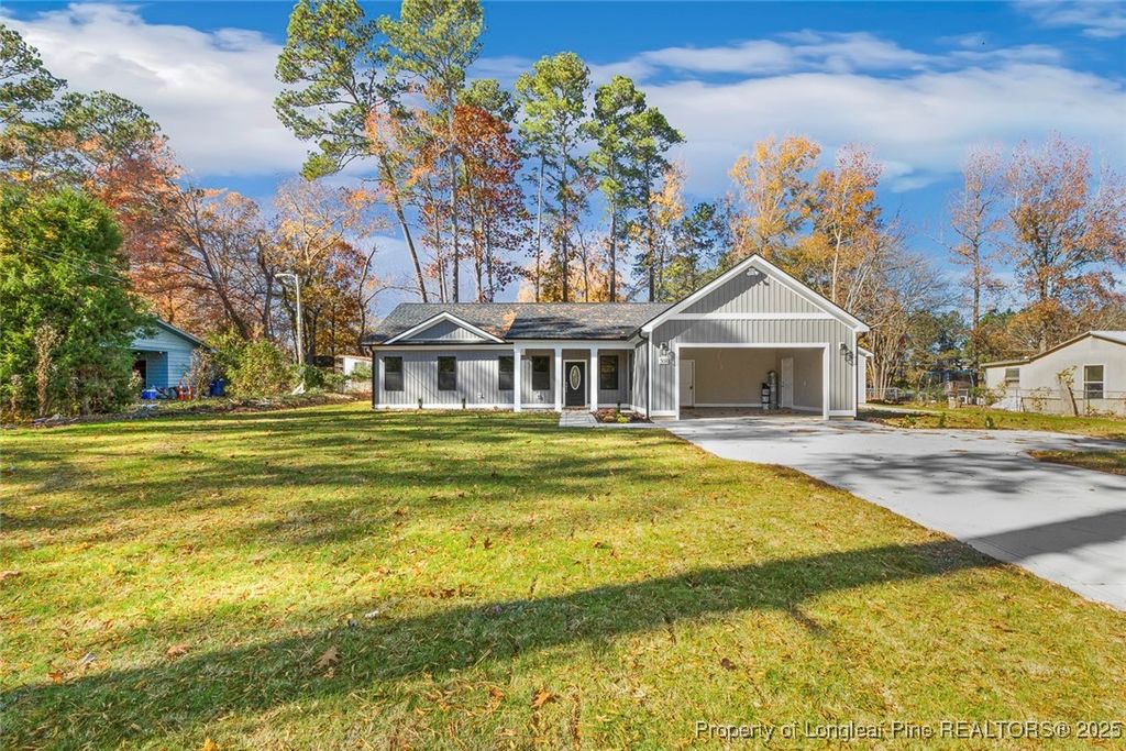 Photo of 504 Nixon Drive, Sanford, NC 27330 (MLS # 753257)