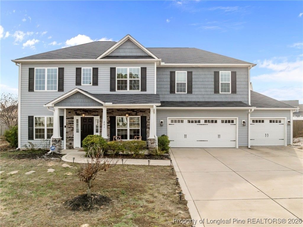 Photo of 201 Weston Woods Street, Raeford, NC 28376 (MLS # 755809)