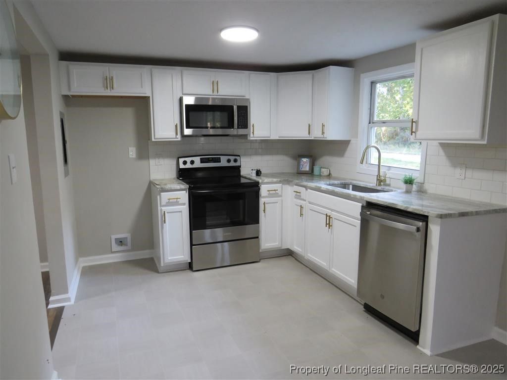 Photo of 1613 Halsey Loop, Hope Mills, NC 28348 (MLS # 752046)
