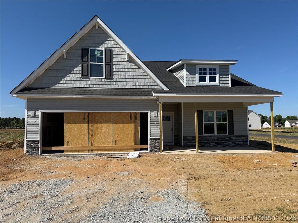 Photo of 84 Grady Farm Way, Benson, NC 27504 (MLS # 761388)