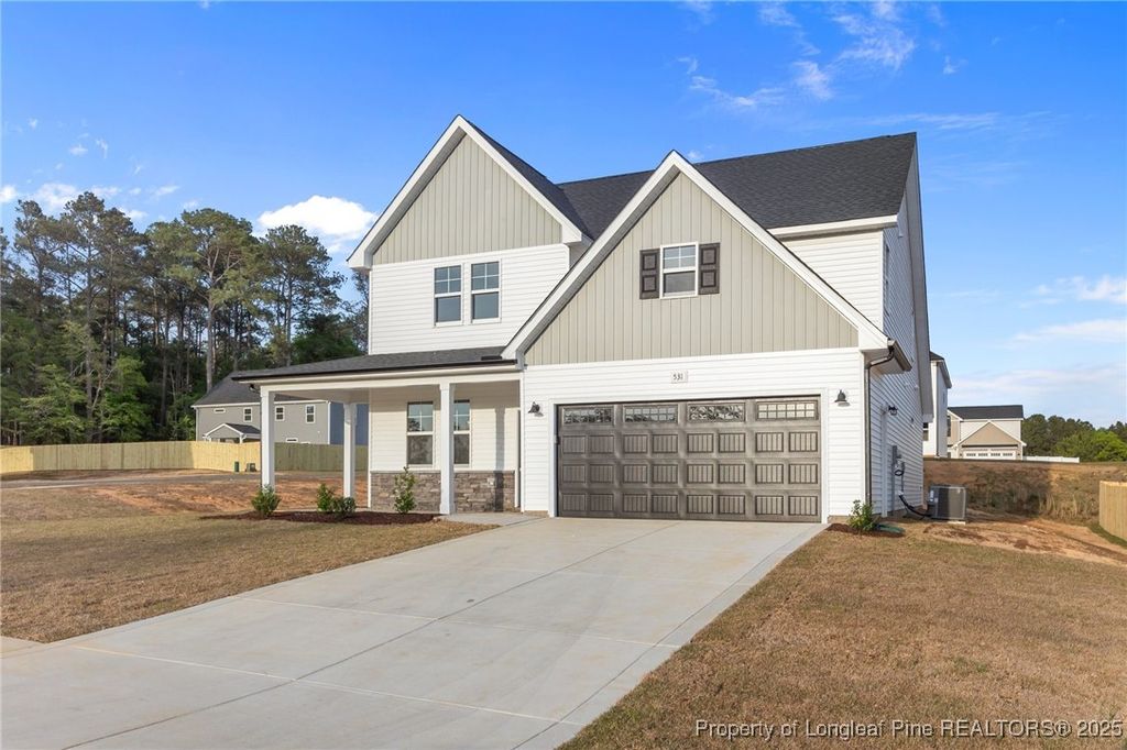 Photo of 531 Southerland Peak, Raeford, NC 28376 (MLS # 737969)