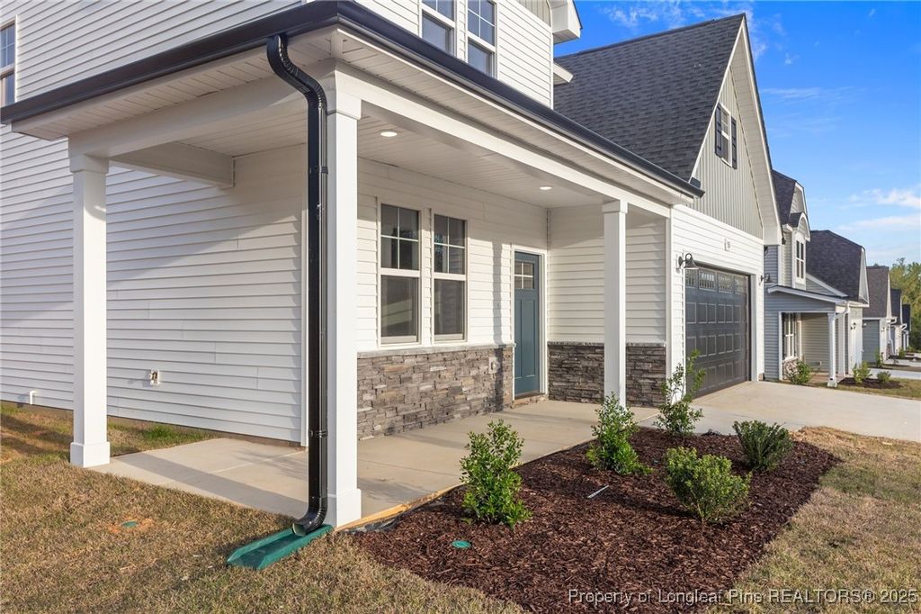 Photo of 531 Southerland Peak, Raeford, NC 28376 (MLS # 737969)