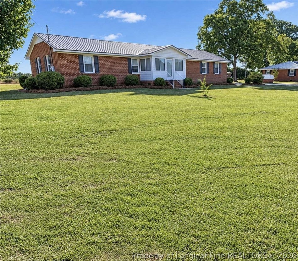 Photo of 6080 Suttontown Road, Faison, NC 28341 (MLS # 771524)